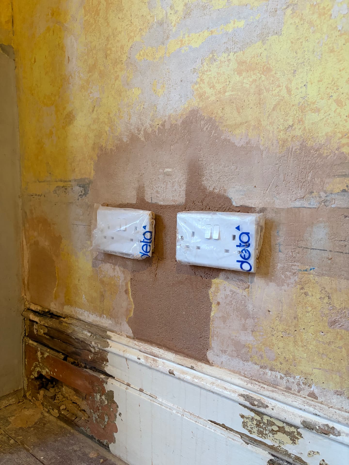 Newly fitted double sockets protected before plastering