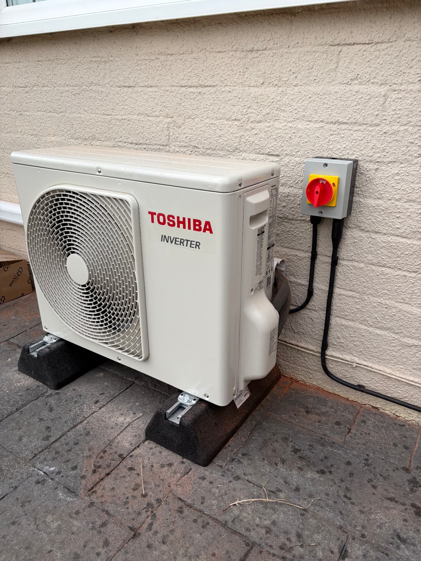 Outdoor air conditioning unit supply with weatherproof rotary isolator