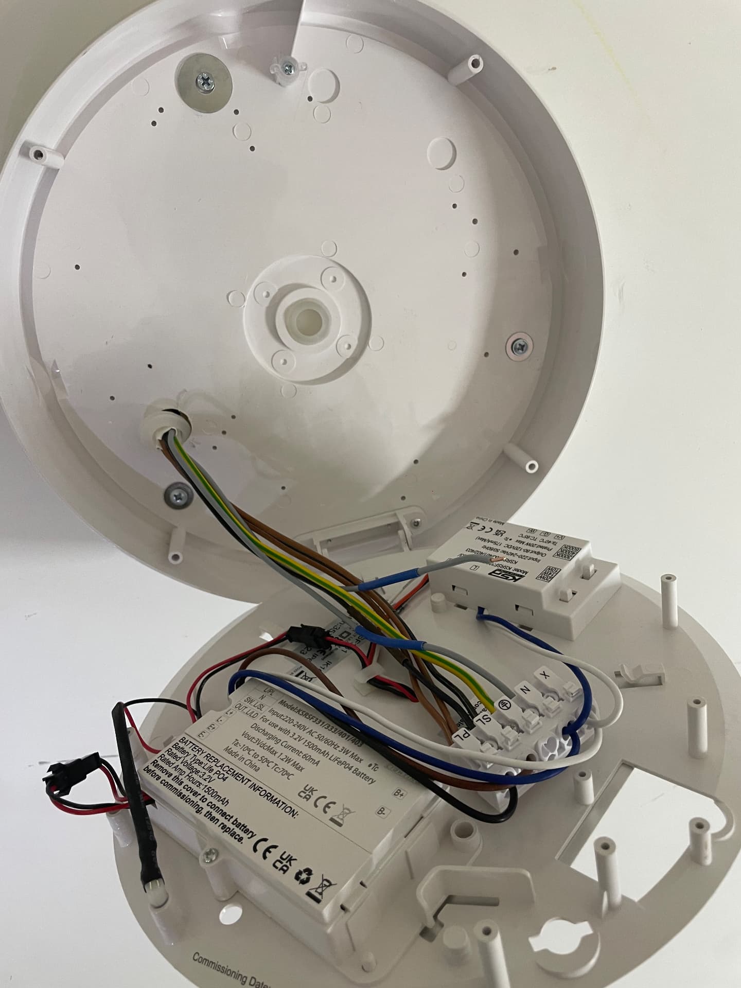 Emergency bulkhead light fitting opened up to diagnose a control gear failure