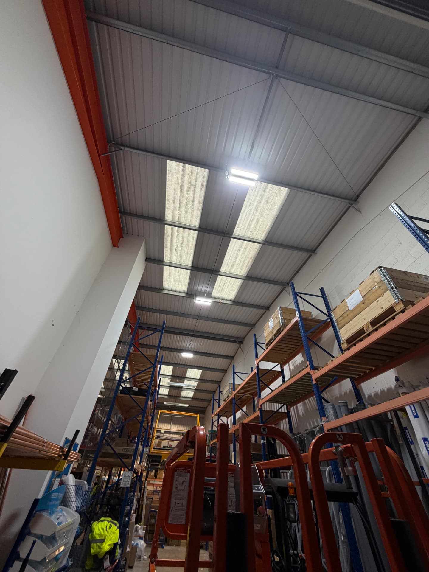 LED batten lighting installed across a warehouse and racking area in Southampton