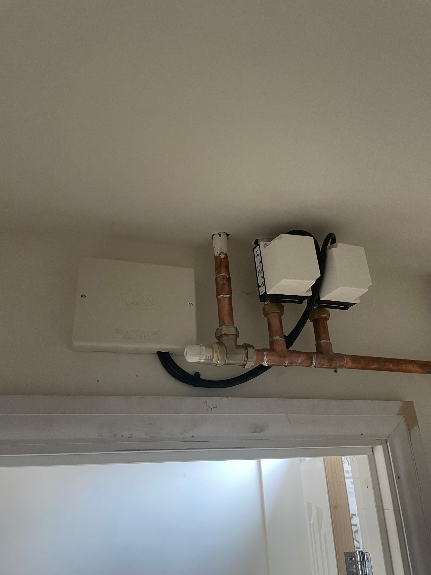 Heating zone valves and wiring centre wired up for electric heating controls
