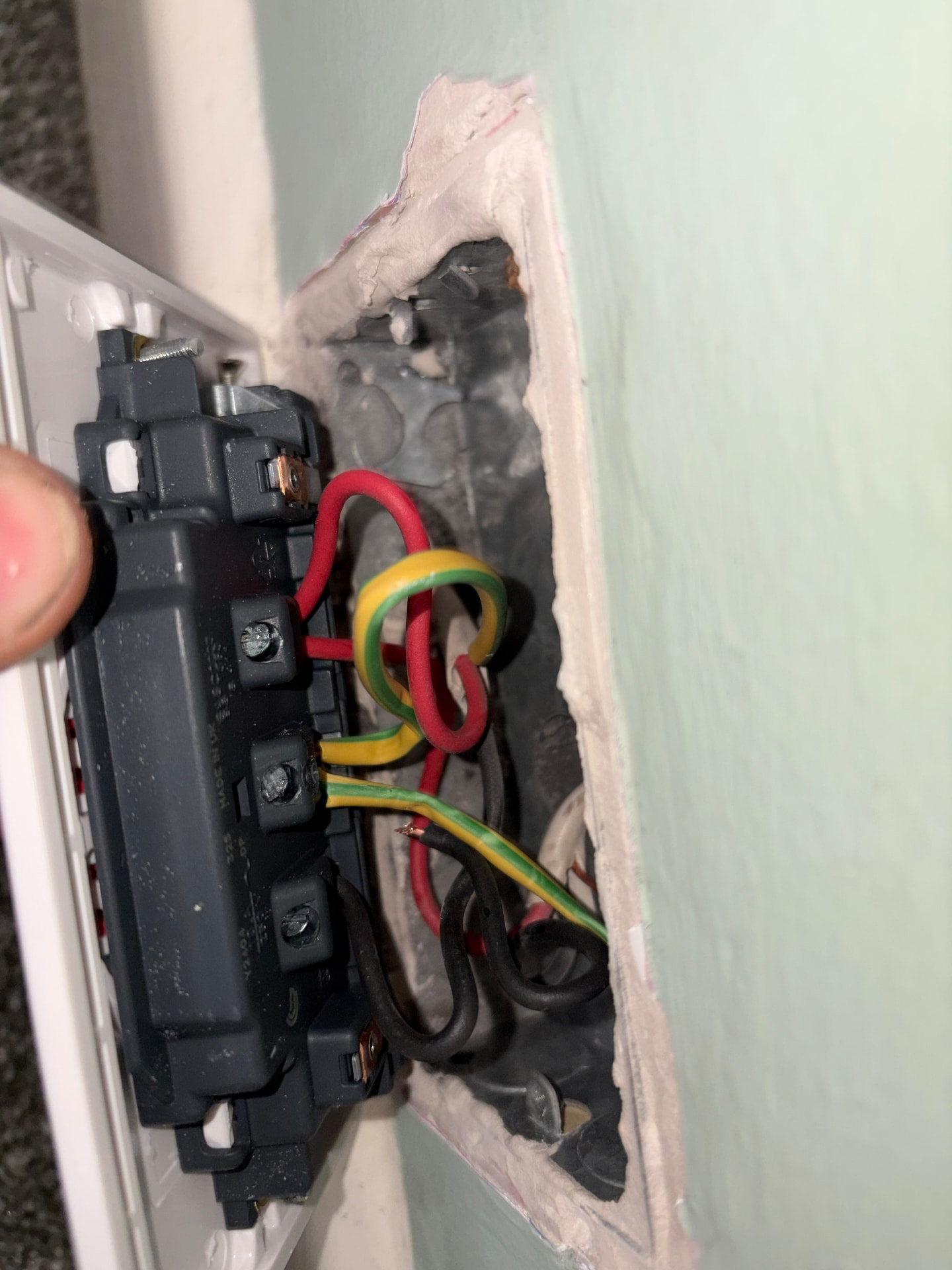 Light switch on old red and black wiring colours checked during fault finding