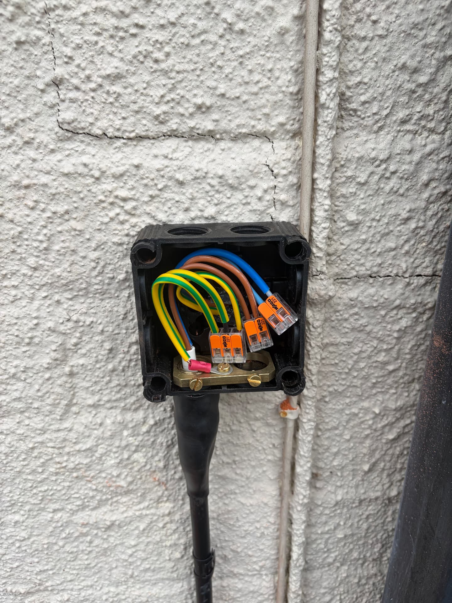 Weatherproof external junction box wired for a garden lighting circuit