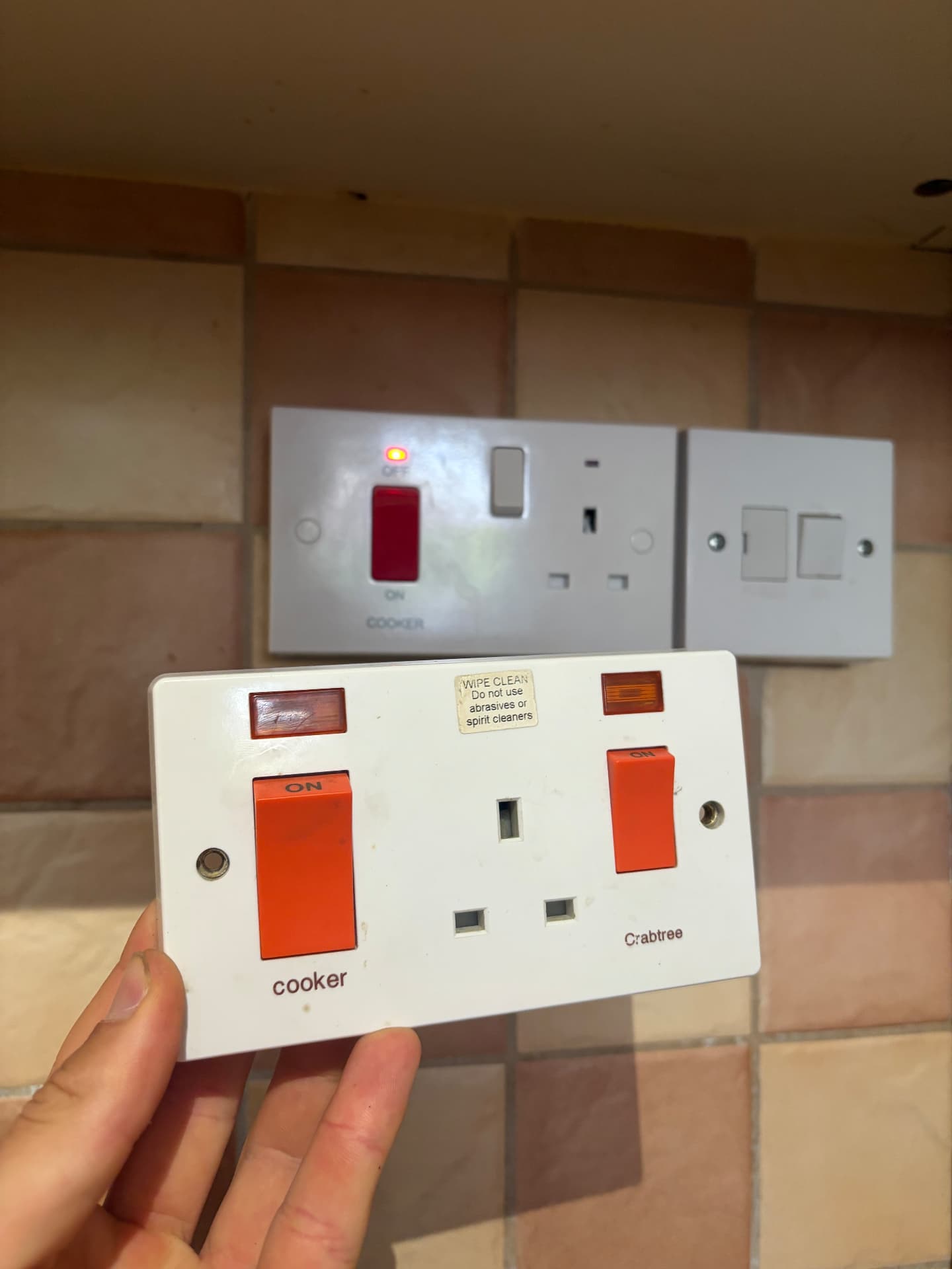 Faulty cooker switch removed and replaced with a new cooker control unit