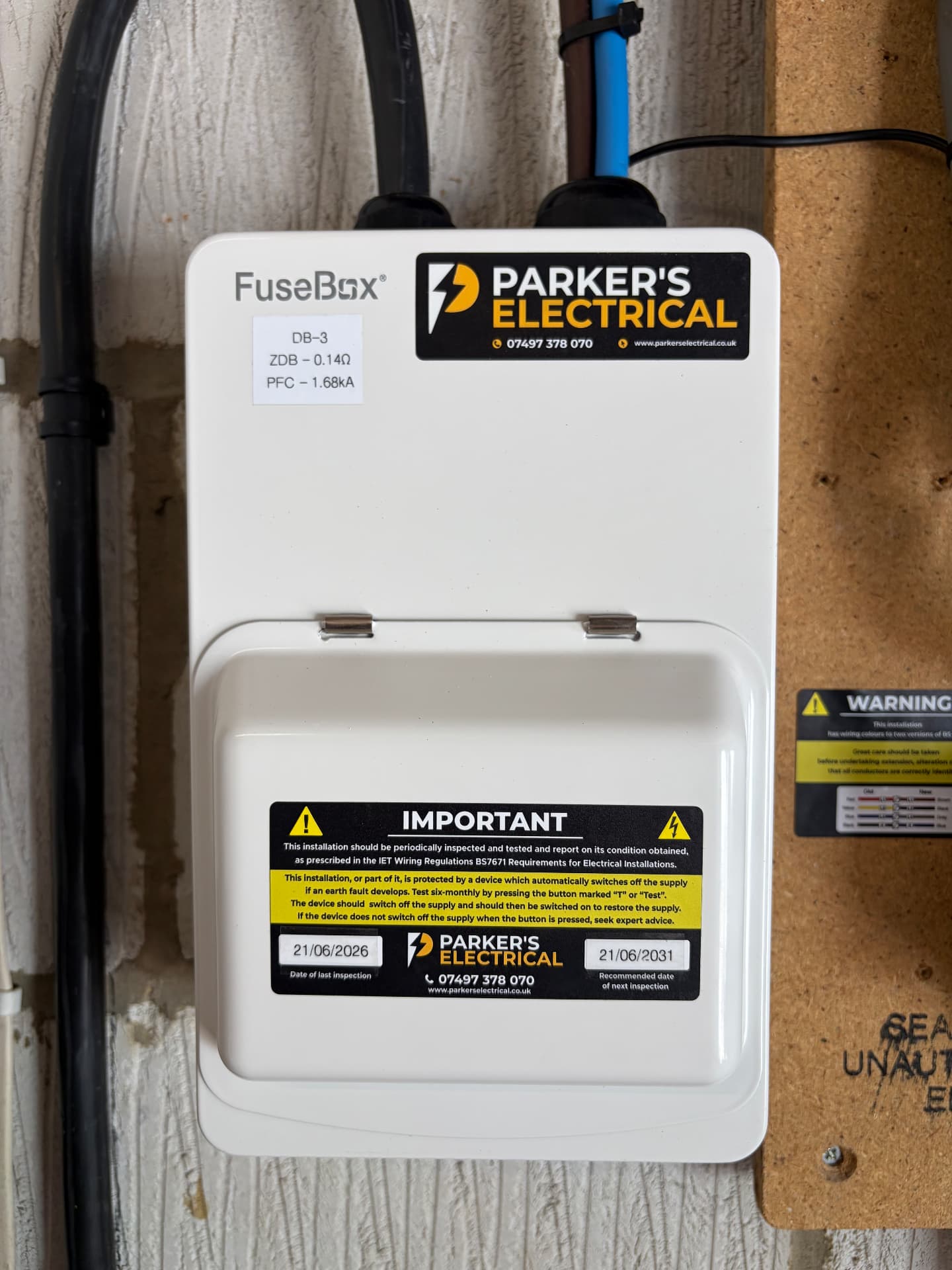Garage sub-board installed and labelled with inspection dates by Parker’s Electrical