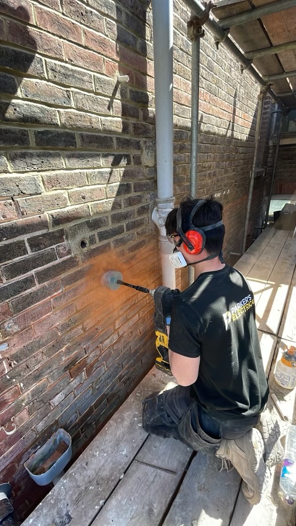 Core drilling an external wall for an extractor fan duct in Southampton