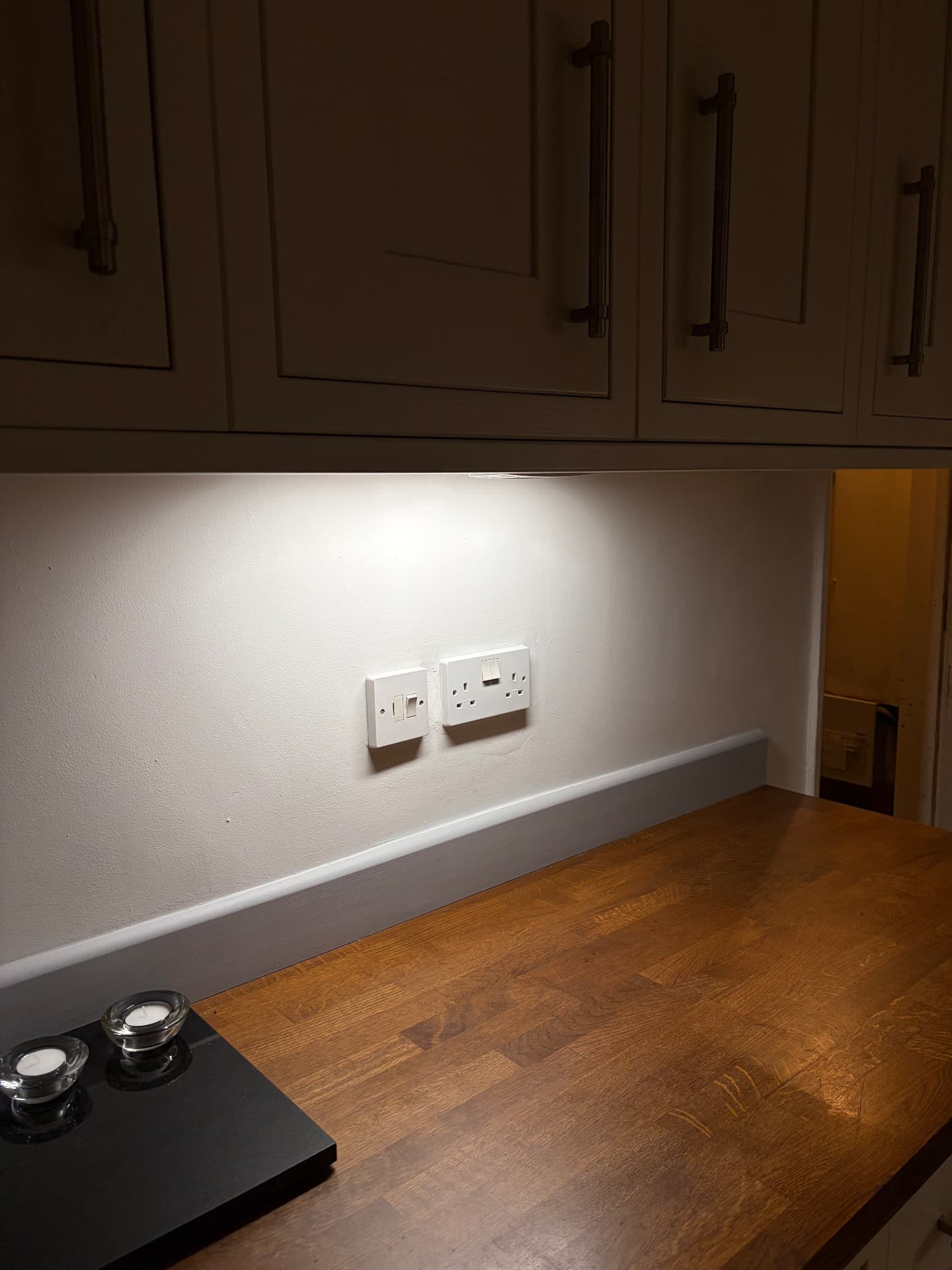 Under-cabinet kitchen lighting with new switched socket and fused connection unit
