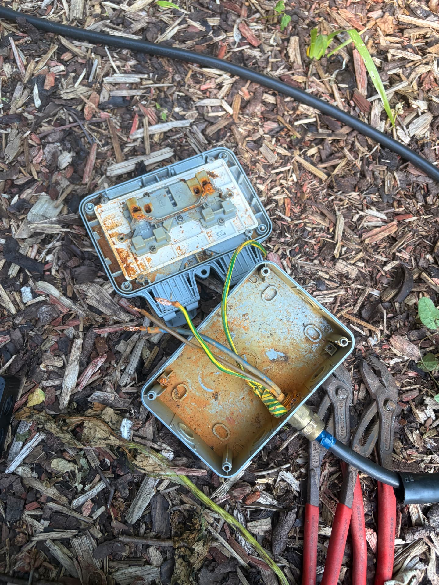 Corroded external junction box replaced after water ingress